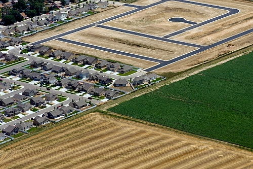 Urban sprawl into farmland. Near Longmont, CO. Photo by John Wark. (airphotona.com)