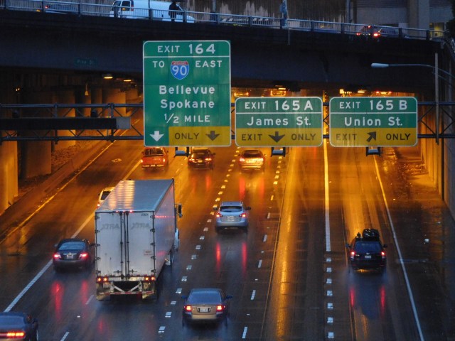 An oft-cited problem with I-5 is how narrow it is, but it's actually up to six lanes in each direction in downtown. A creative redesign of multiple "exit only" lanes could be one cheap solution. (Photo by the author)