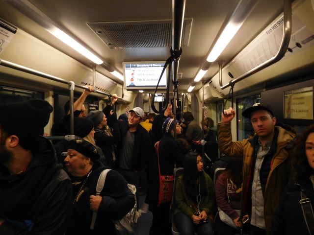 Riders on one of the first runs of the First Hill Streetcar. (Photo by the author)
