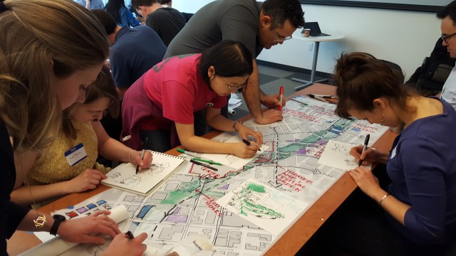 Another charrette team sketches out their design concept. (Photo by the author)