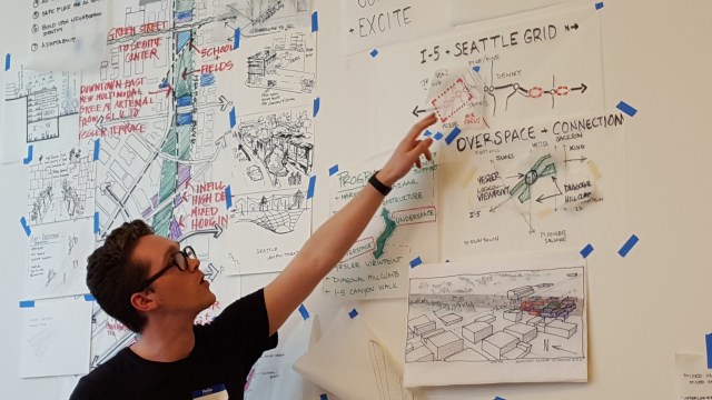 Tiernan Martin describe his team's concept. (Photo by the author)